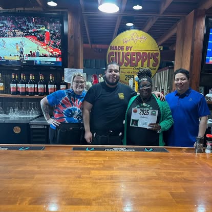 Giuseppi's team members celebrate DJ's Day of Giving